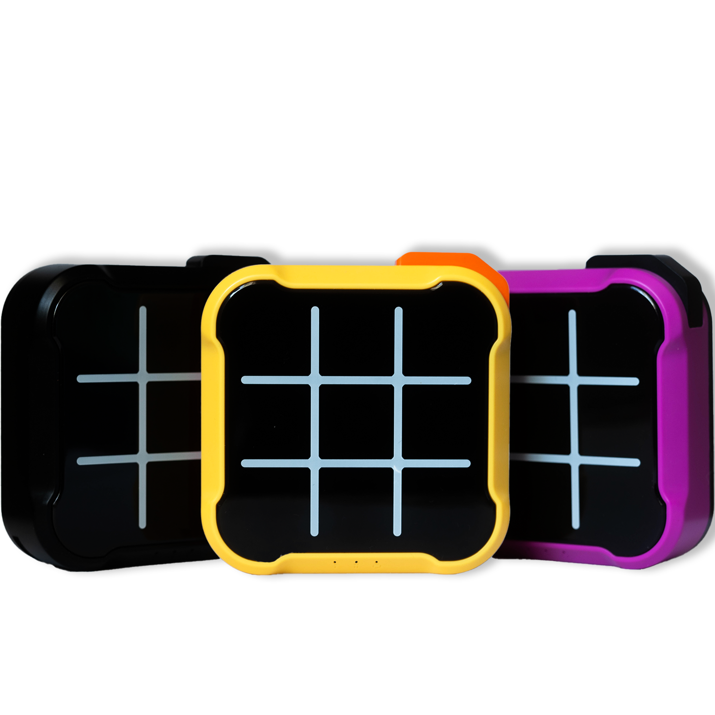 Three electronic Tic Tac Toe boards in yellow, black, and purple colors turned off, side by side
